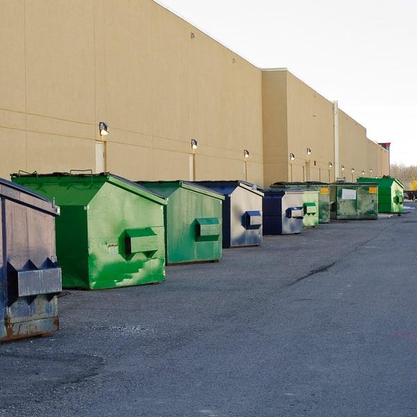 overflowing commercial waste container in need of emptying